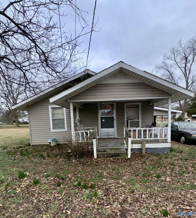 view of front of home featuring covered porch