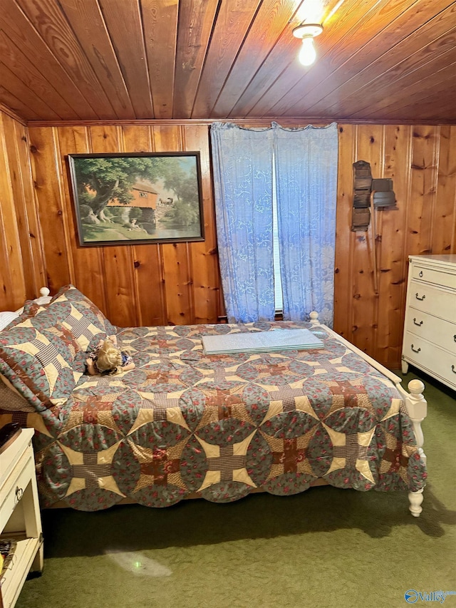 carpeted bedroom featuring wood ceiling and wood walls
