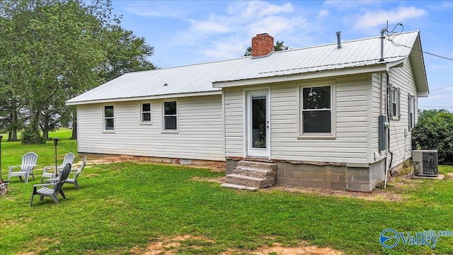 1760 Horseshoe Bend Rd, Scottsboro, AL 35769 - back of property with entry steps, a chimney, a yard, and a metal roof