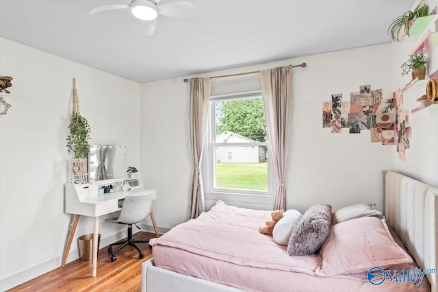 1760 Horseshoe Bend Rd, Scottsboro, AL 35769 - bedroom featuring radiator, light wood-style floors, and a ceiling fan