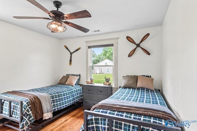 1760 Horseshoe Bend Rd, Scottsboro, AL 35769 - bedroom with wood finished floors and ceiling fan