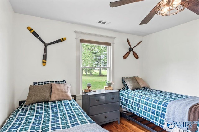 1760 Horseshoe Bend Rd, Scottsboro, AL 35769 - bedroom with dark wood finished floors and a ceiling fan