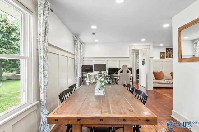 1760 Horseshoe Bend Rd, Scottsboro, AL 35769 - dining area with a decorative wall, healthy amount of natural light, wood finished floors, recessed lighting, and wainscoting