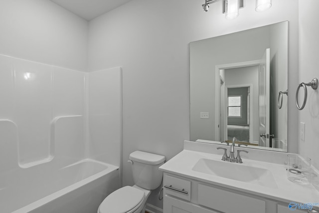 bathroom featuring shower / tub combination, vanity, and toilet