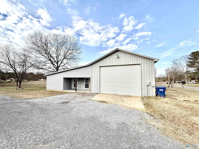 view of outbuilding featuring a garage