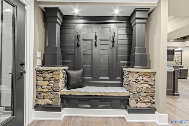 mudroom with light hardwood / wood-style flooring