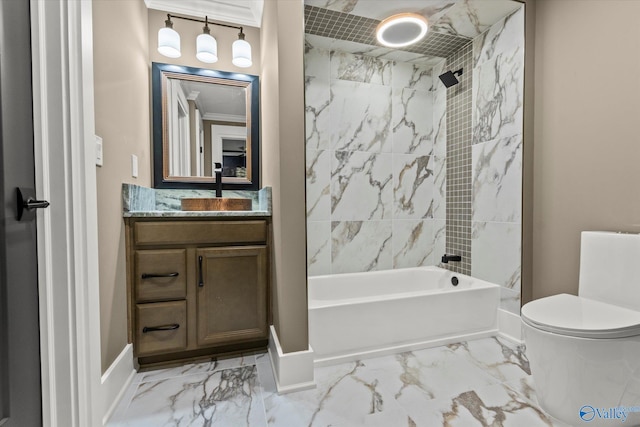 full bathroom with vanity, toilet, and tiled shower / bath combo