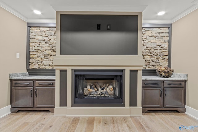 room details featuring hardwood / wood-style floors and crown molding