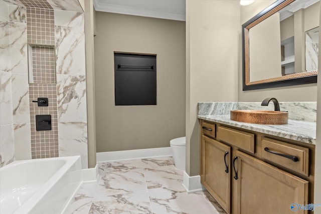 full bathroom with tiled shower / bath, ornamental molding, toilet, and vanity