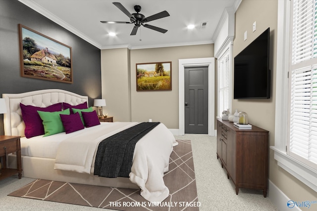 bedroom with multiple windows, light colored carpet, ornamental molding, and ceiling fan