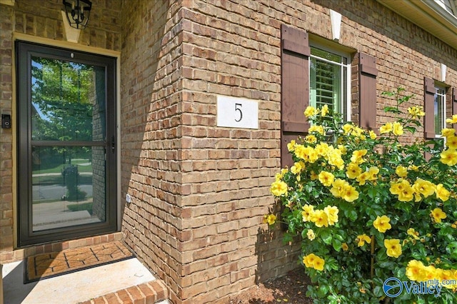 5 Leyland Dr, Huntsville, AL 35824 - property entrance featuring brick siding
