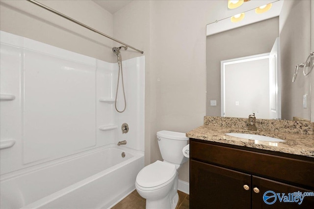 5 Leyland Dr, Huntsville, AL 35824 - bathroom featuring toilet, baseboards, vanity, and  shower combination