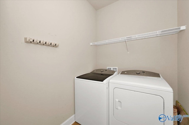 5 Leyland Dr, Huntsville, AL 35824 - laundry area with washer and dryer and baseboards