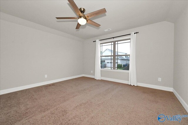 5 Leyland Dr, Huntsville, AL 35824 - carpeted spare room featuring a ceiling fan, baseboards, and lofted ceiling