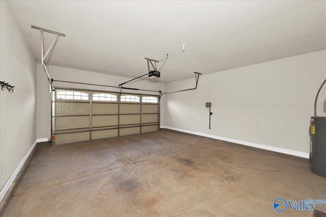5 Leyland Dr, Huntsville, AL 35824 - garage featuring water heater, baseboards, and a garage door opener