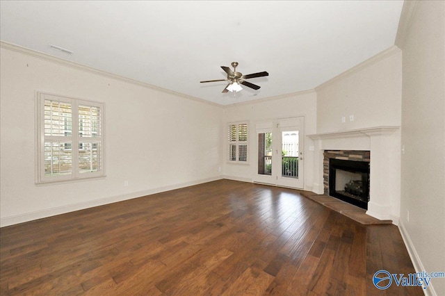 5 Leyland Dr, Huntsville, AL 35824 - unfurnished living room featuring ornamental molding, wood finished floors, a ceiling fan, a fireplace, and baseboards