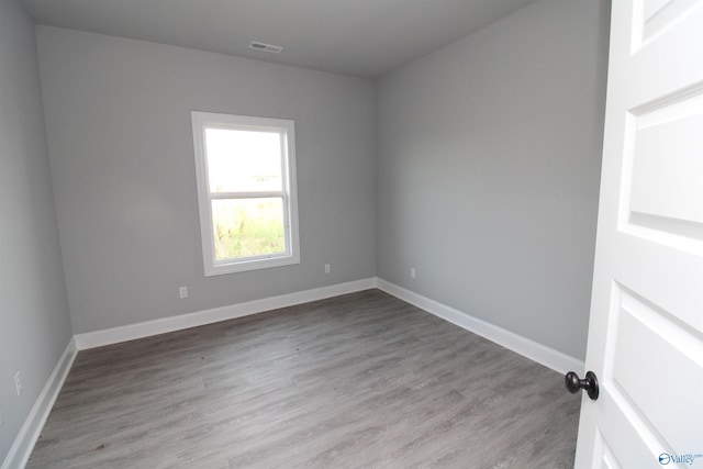 empty room with light wood-type flooring