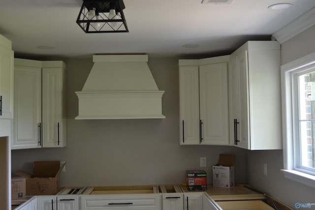 3720 Tidmore Bend Rd, Gadsden, AL 35901 - kitchen featuring white cabinetry, light countertops, open shelves, and premium range hood