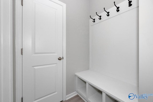 mudroom with light hardwood / wood-style floors