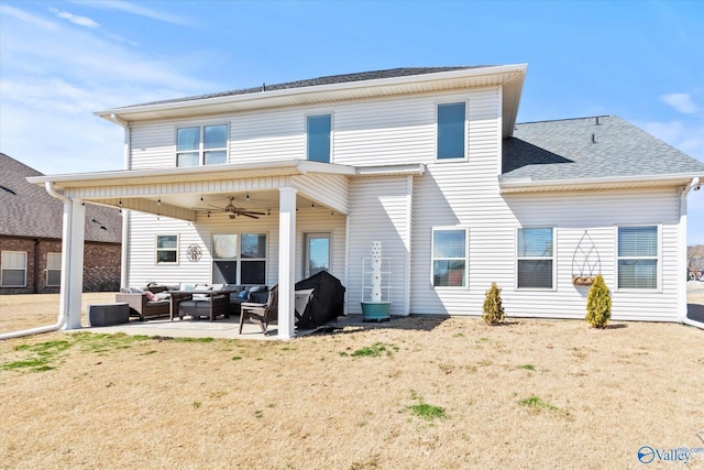 back of property featuring a yard, a patio, a shingled roof, an outdoor hangout area, and ceiling fan