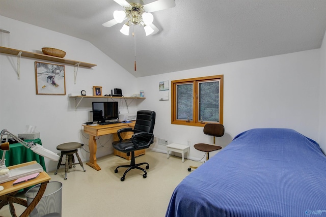 carpeted bedroom featuring ceiling fan and vaulted ceiling