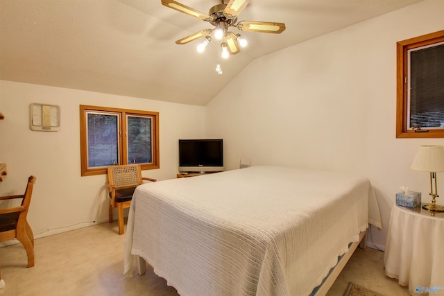 bedroom with light carpet, ceiling fan, and vaulted ceiling