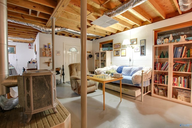 sitting room featuring concrete floors