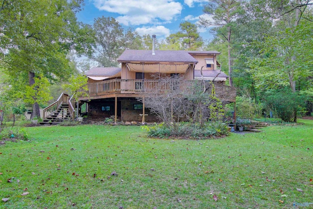 back of house with a lawn and a wooden deck