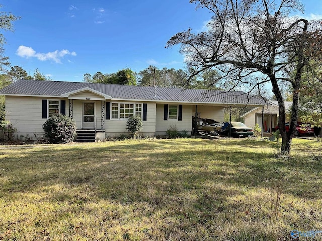 single story home featuring a front lawn and a carport