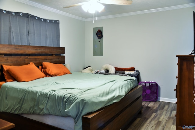 bedroom featuring ceiling fan, baseboards, ornamental molding, electric panel, and wood finished floors