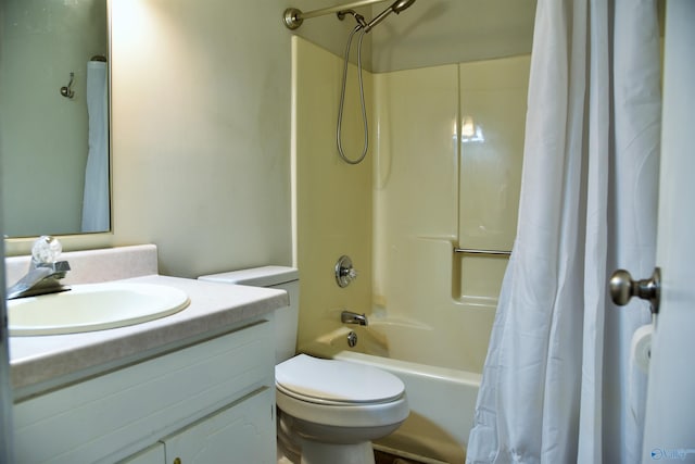 full bathroom featuring shower / tub combo, toilet, and vanity