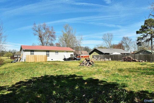 view of yard featuring fence