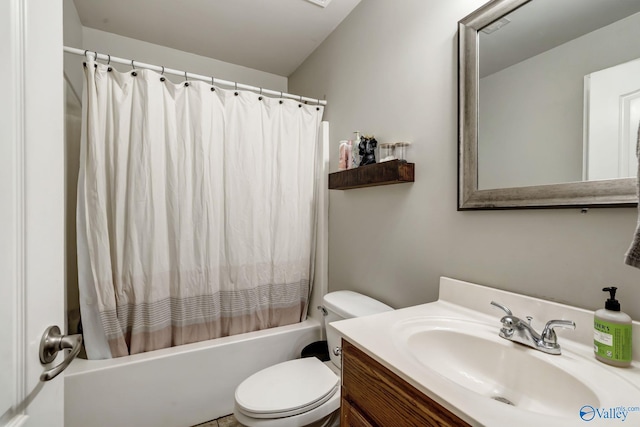 full bathroom with shower / bathtub combination with curtain, vanity, and toilet