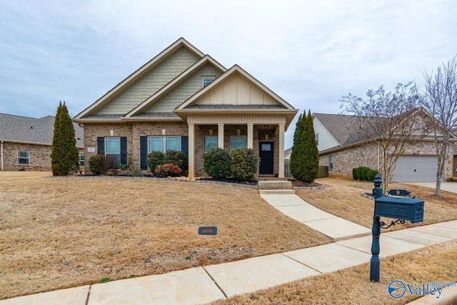 craftsman-style home with board and batten siding and brick siding