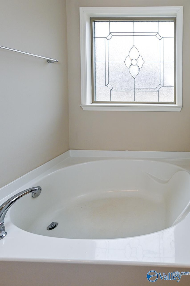 9 Leyland Dr SW, Huntsville, AL 35824 - full bathroom featuring a bathtub and a wealth of natural light