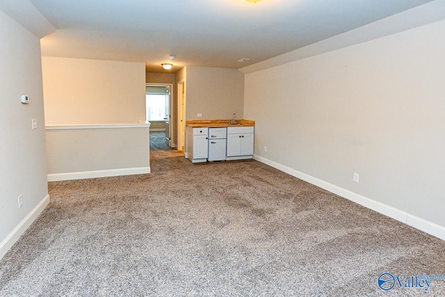 9 Leyland Dr SW, Huntsville, AL 35824 - unfurnished room with carpet, a sink, and baseboards