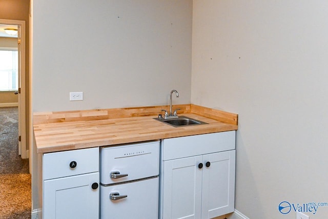 9 Leyland Dr SW, Huntsville, AL 35824 - bathroom with baseboards and a sink