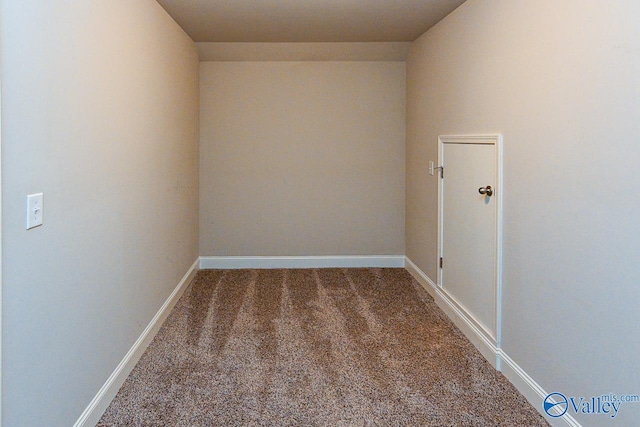 9 Leyland Dr SW, Huntsville, AL 35824 - carpeted empty room with baseboards