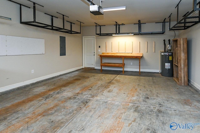 9 Leyland Dr SW, Huntsville, AL 35824 - garage with a garage door opener, electric panel, electric water heater, and baseboards