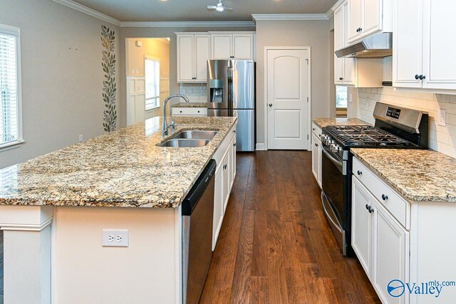 9 Leyland Dr SW, Huntsville, AL 35824 - kitchen featuring appliances with stainless steel finishes, a kitchen island with sink, a sink, and under cabinet range hood