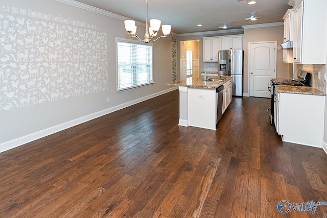 9 Leyland Dr SW, Huntsville, AL 35824 - kitchen with a kitchen island with sink, under cabinet range hood, white cabinets, hanging light fixtures, and appliances with stainless steel finishes
