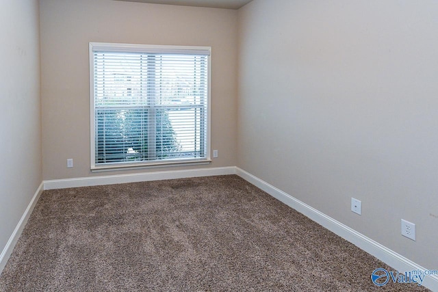 9 Leyland Dr SW, Huntsville, AL 35824 - unfurnished room with carpet and baseboards