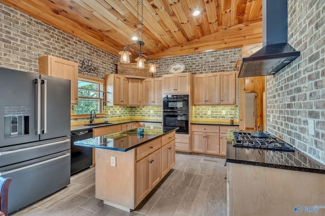 kitchen featuring light brown cabinets, wall chimney exhaust hood, sink, black appliances, and a center island