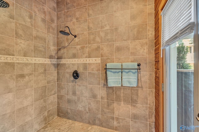 bathroom featuring tiled shower