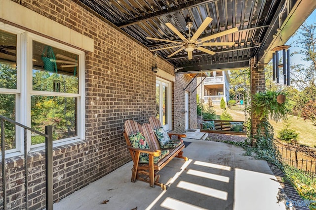 view of patio with ceiling fan