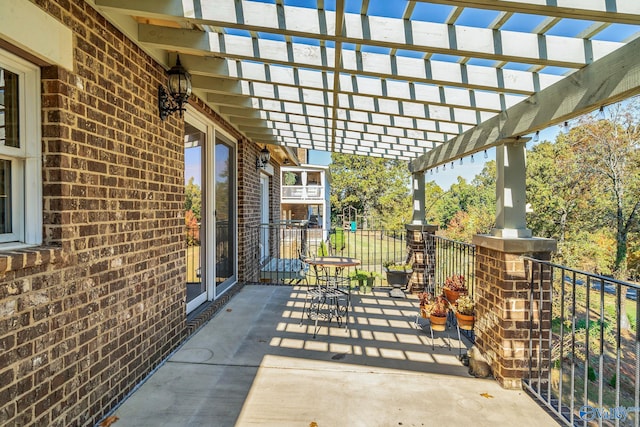 view of patio featuring a pergola