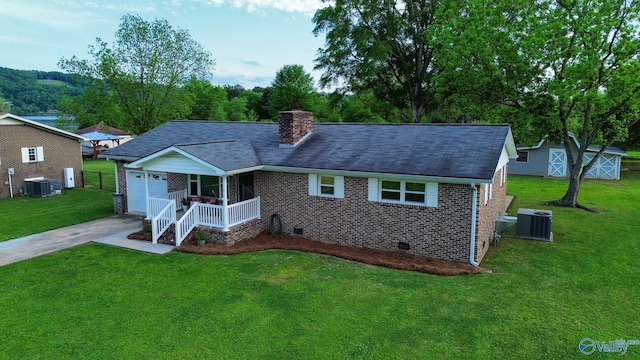 view of front of property with brick siding, driveway, crawl space, and cooling unit