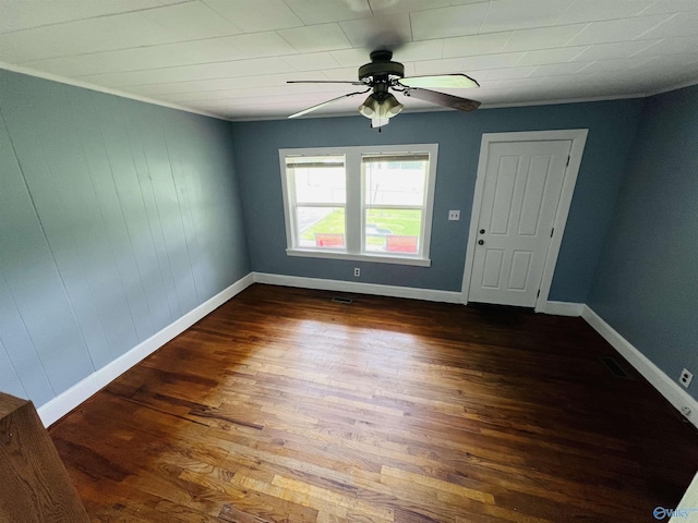 1315 Colbert Ave, Gadsden, AL 35904 - spare room with a ceiling fan and dark wood-style floors