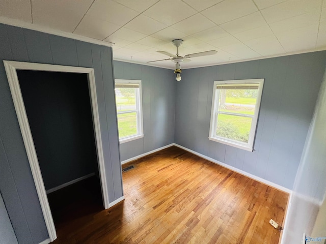 1315 Colbert Ave, Gadsden, AL 35904 - unfurnished bedroom featuring wood finished floors and a ceiling fan