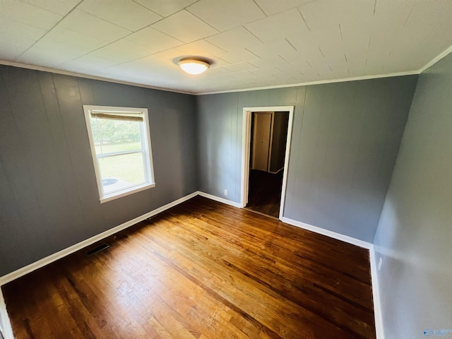 1315 Colbert Ave, Gadsden, AL 35904 - spare room featuring ornamental molding and wood finished floors